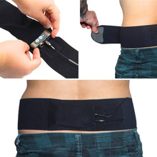 Black waist strap with side pouch, hands attach a device with connected cable