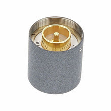 Schoeps MK 2S microphone capsule with open top showing brass contacts inside gray foam