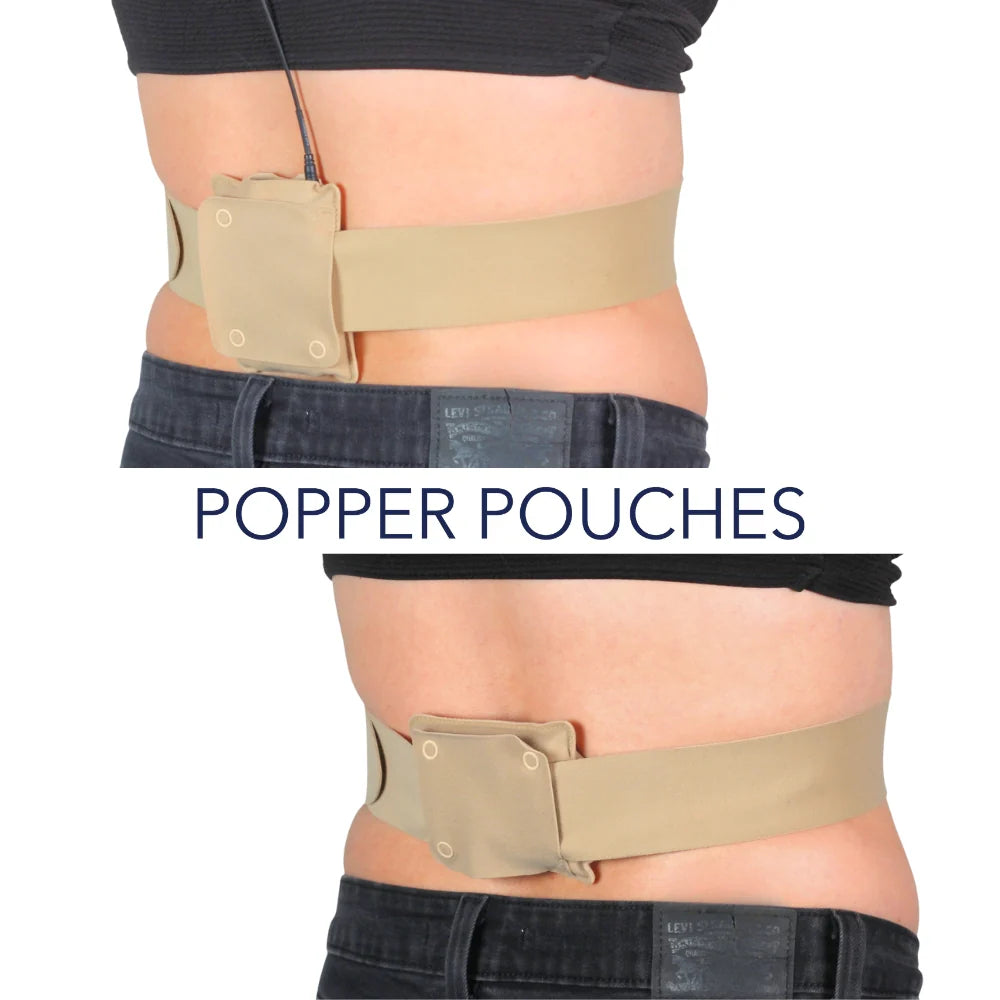 Beige URSA belt with popper-closure pouches on waist over jeans