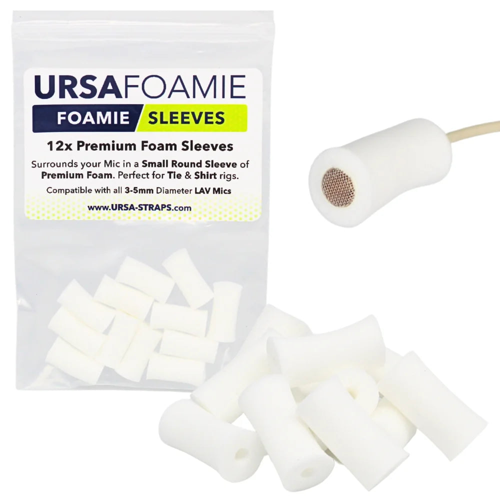 White foam mic sleeves, small round sleeves with one sleeve on a microphone