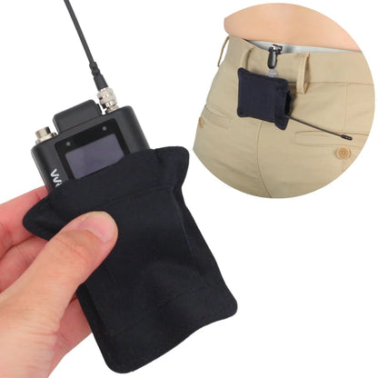 Black belt pouch with clip and small zip pouch detail, worn at the waist