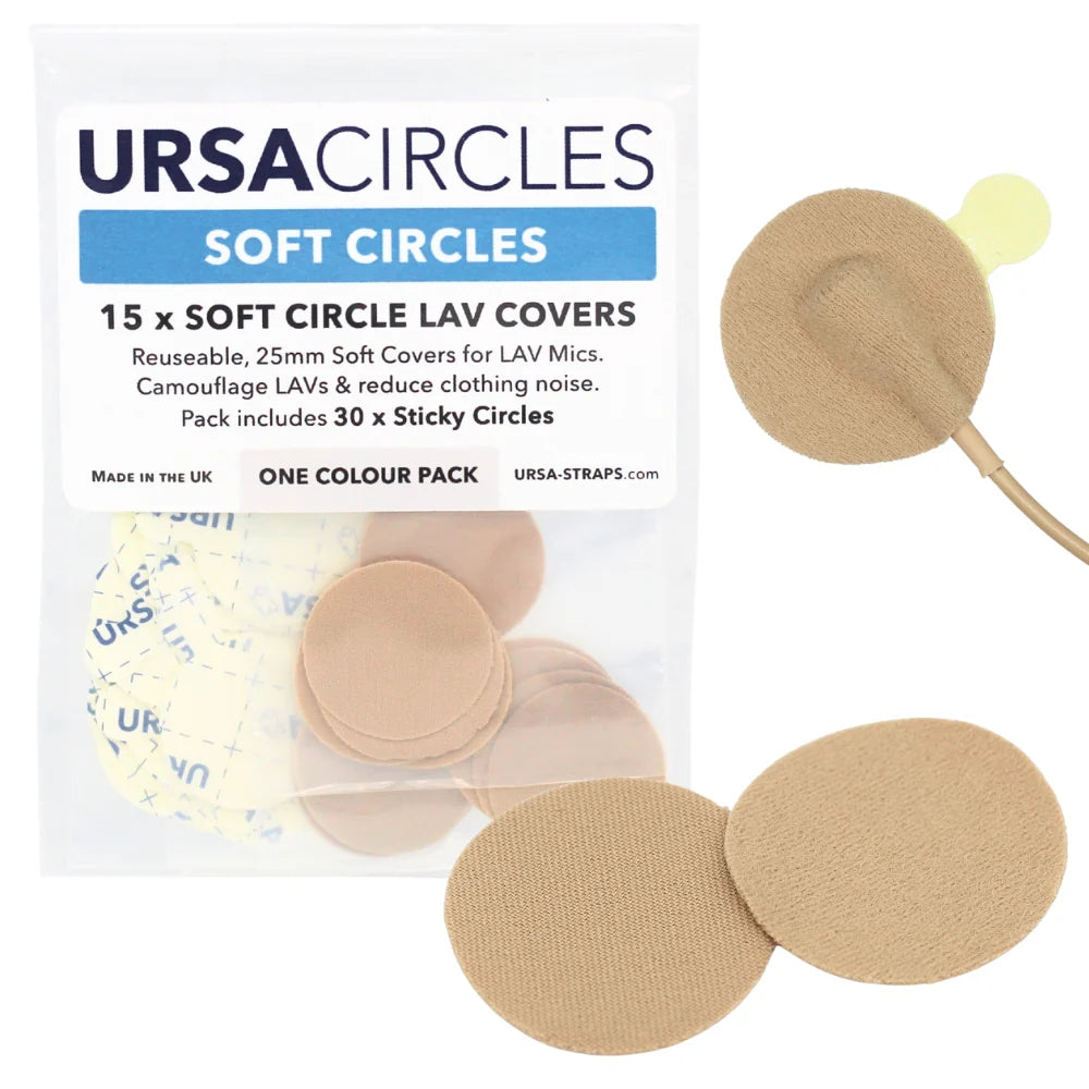 Beige round LAV mic soft cover pads with stickies and a mic attachment.