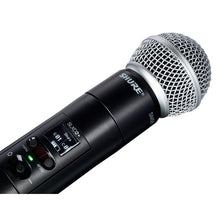 Shure wireless handheld transmitter with SM58 grille and LCD control panel on black handle