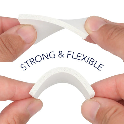Curved heat shield foam strip with speckled texture, held between two fingers