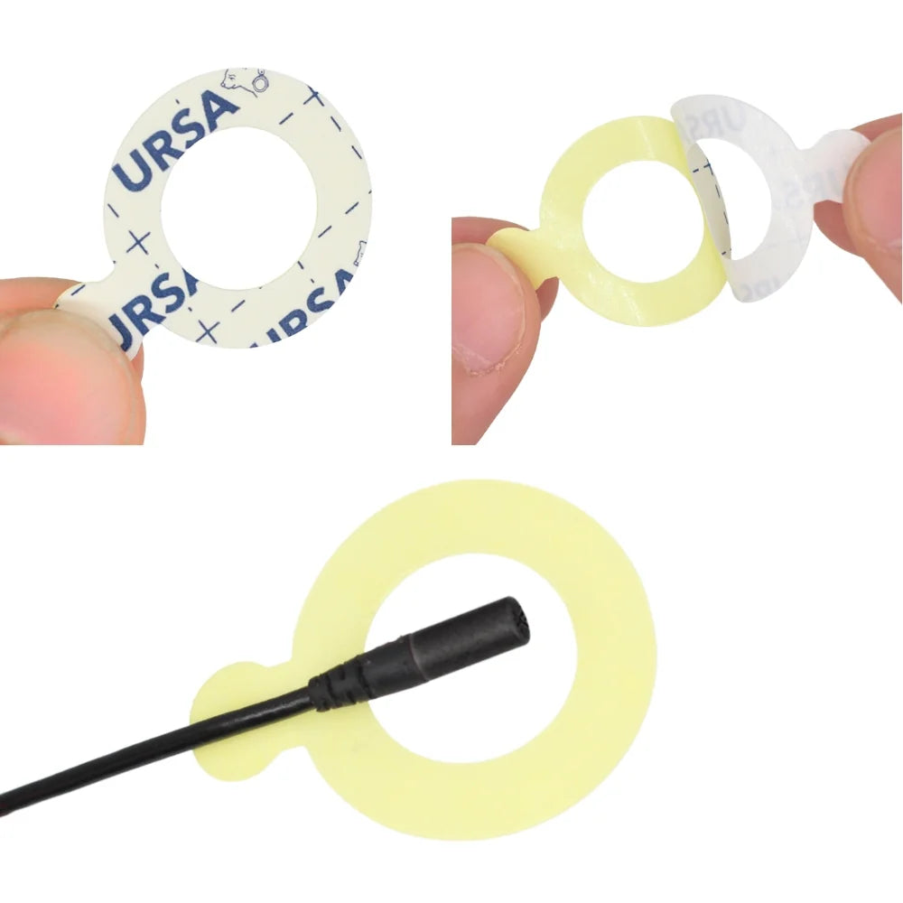 URSA-branded sticky ring being applied with a black stick tool onto a yellow base