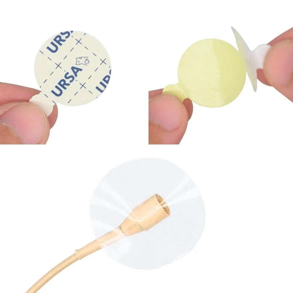Hand peeling a yellow adhesive circle from its backing for use