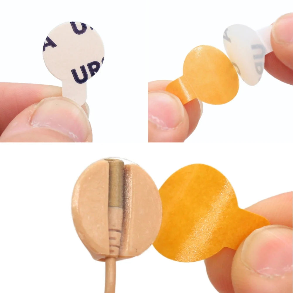 Mini sticky circles with peel-off tab: backing removed to show sticky round dot