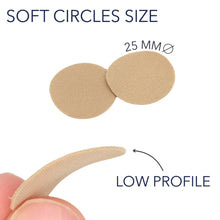 Two beige fabric adhesive circles on sticks, low-profile oval shape