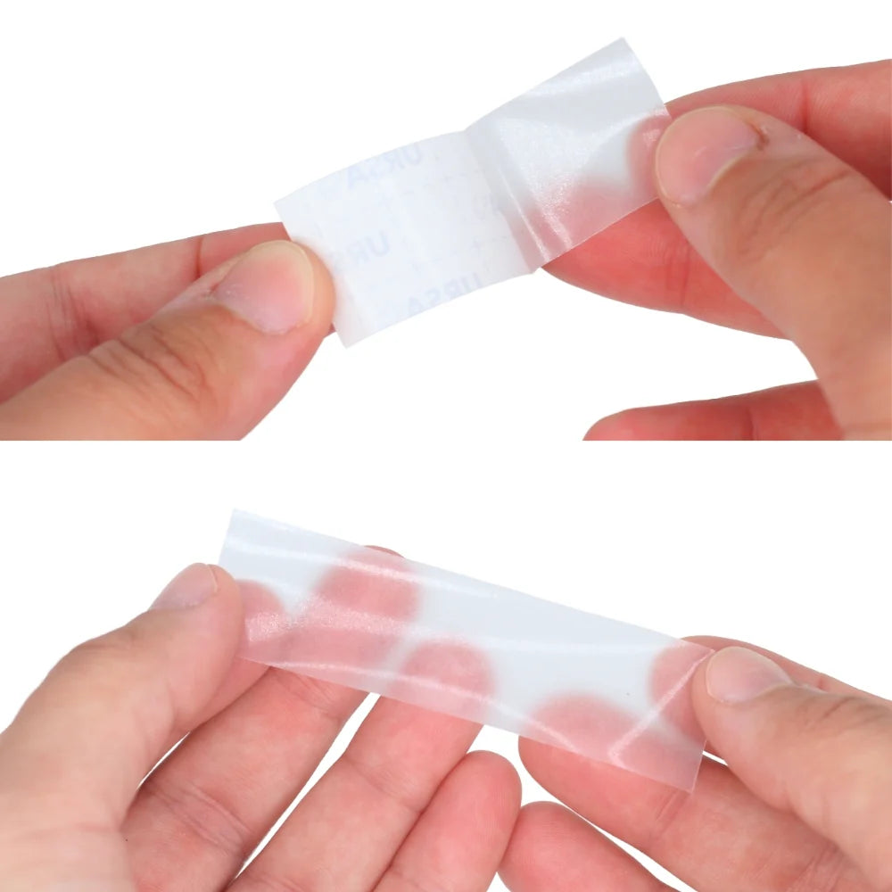 Invisi Strips clear single-sided adhesive strips held between fingers