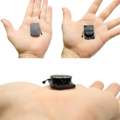 Small black URSA clip-on mics with wires, shown held in two open hands