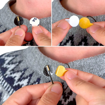 Mini sticky circles being applied: white and yellow backing dots on a fabric loop