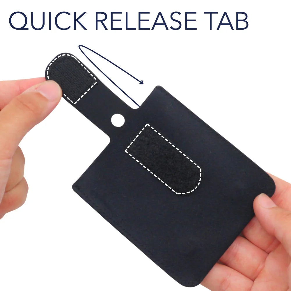Black pouch with quick-release tab and snap flap, held in hands