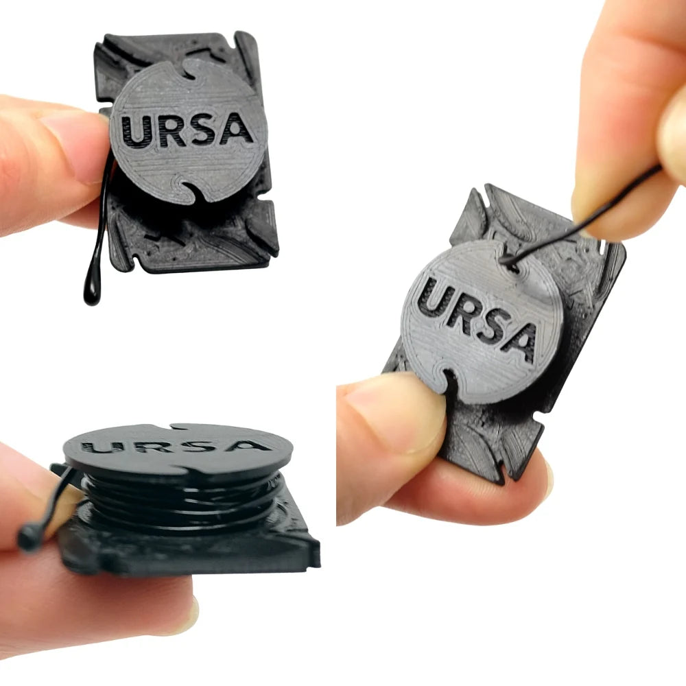 Black URSA clip mic with cable shown in close-up from multiple angles