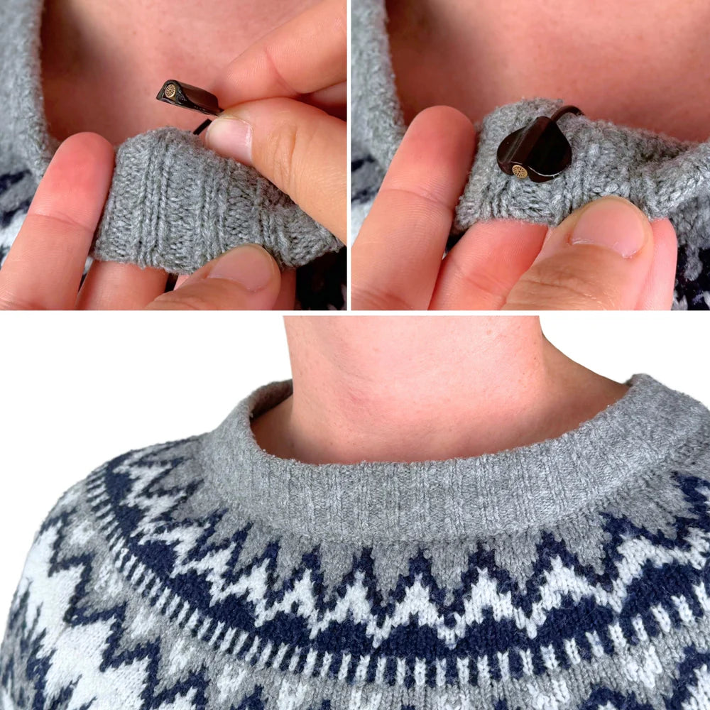 Mini sticky circles detail: peel-off tab lifted from a gray knitted collar area