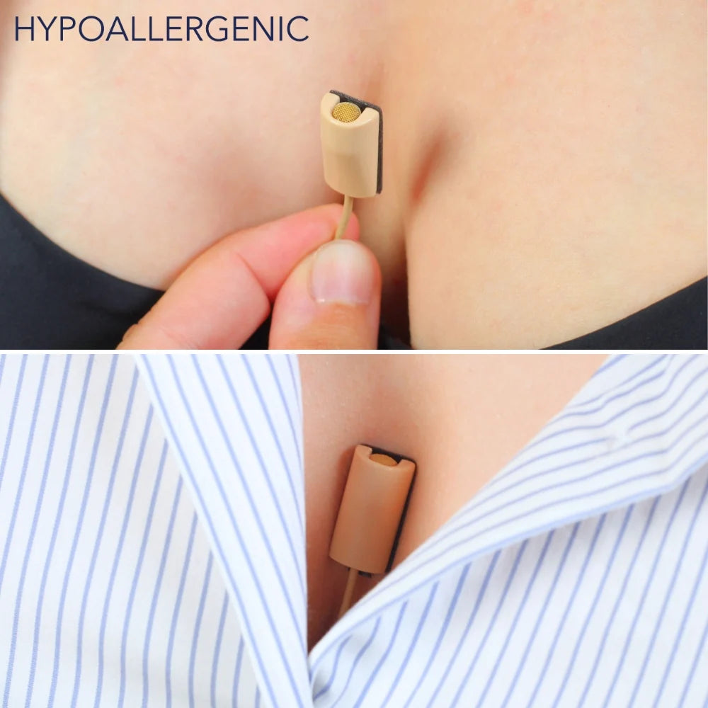 Beige MiniMount lav mic mount clipped on skin near neckline with connector