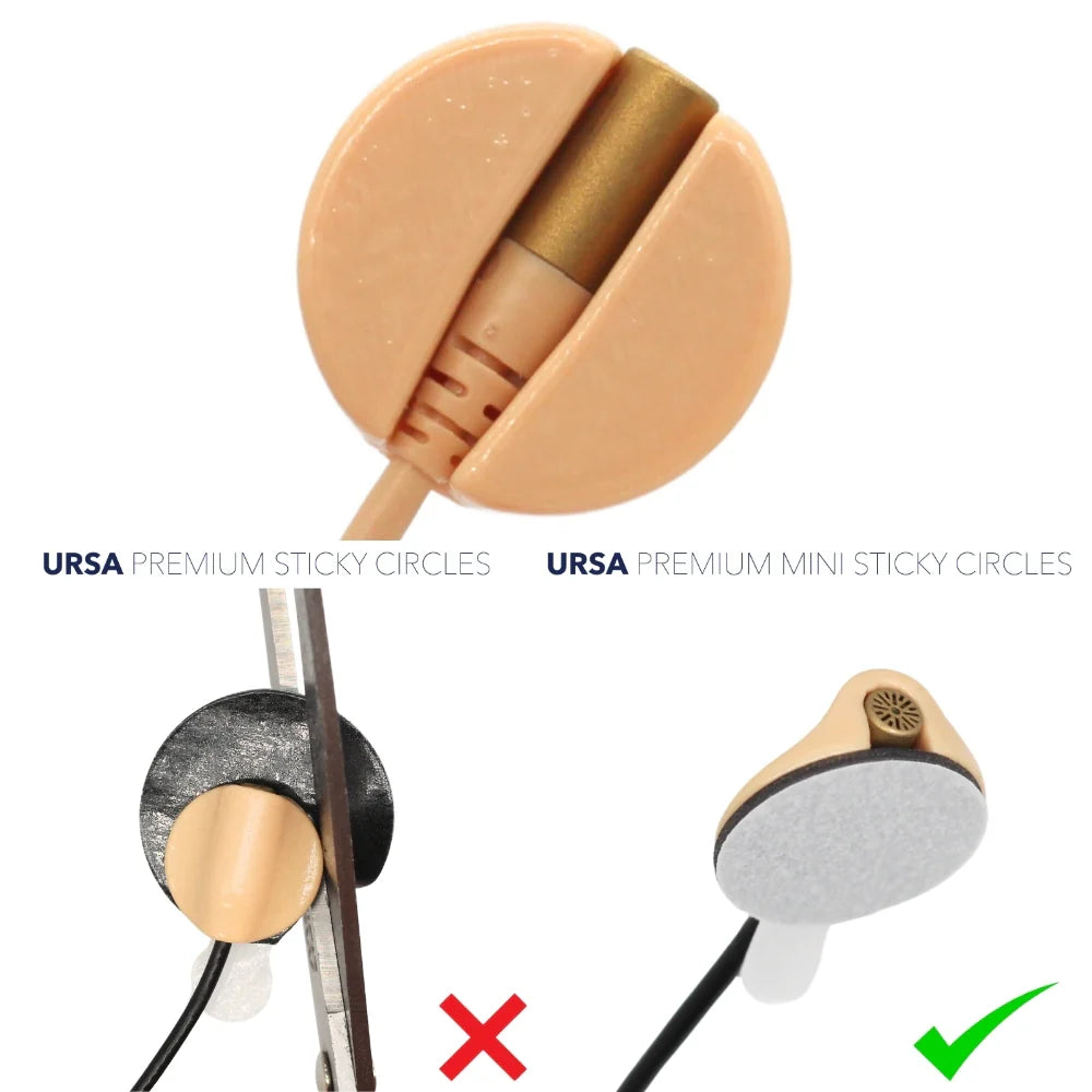 Sticky circles with tan paper backing and gray felt pads attached to black cords