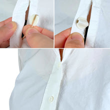 Mini sticky circles close-up: adhesive dots pressed onto fabric for secure sticking