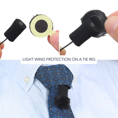 Black plush circle short-fur wind protector placed on a garment edge