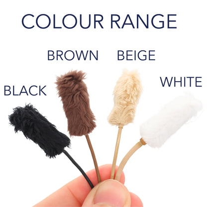 Assorted plush fur microphone sleeves in black, brown, beige, and white