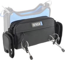 ORCA front pouch with zipper, gray/black body, and side clip straps