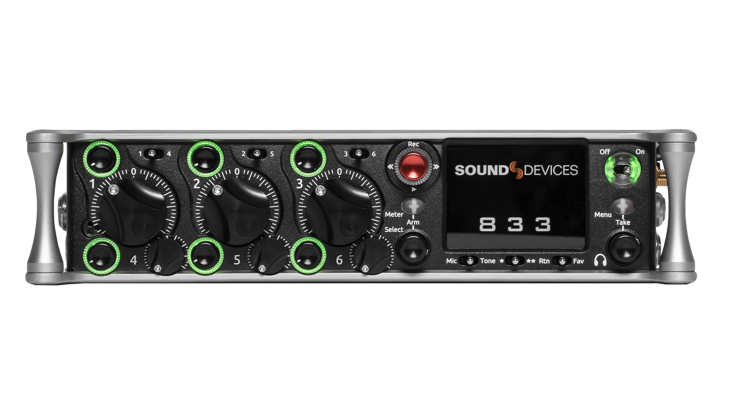 Black audio recorder front panel with knobs, meters, and green-ring controls