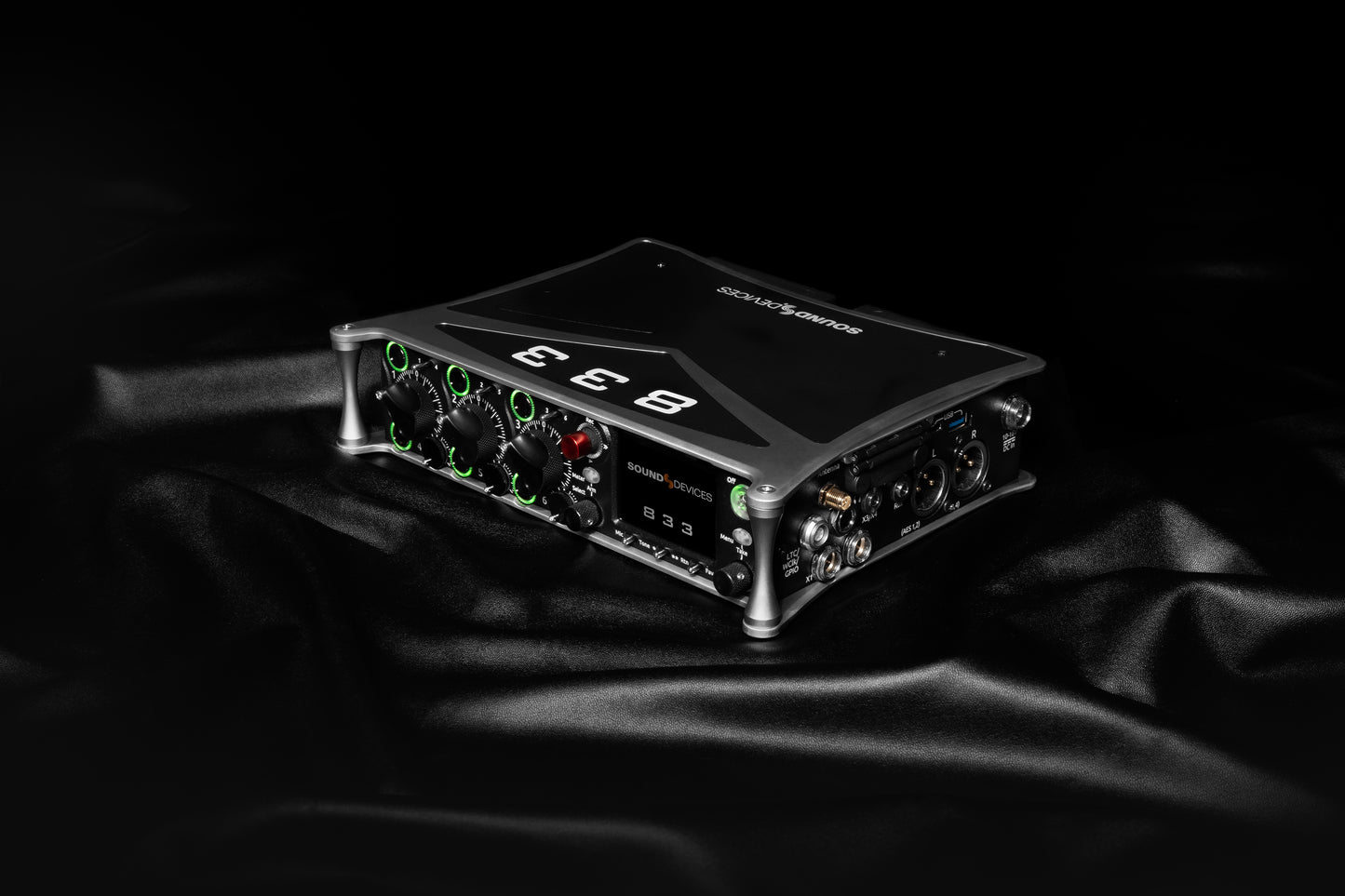 Black audio recorder with angled top panel and front control section