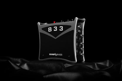 Black audio recorder front corner view with 833 label and side controls