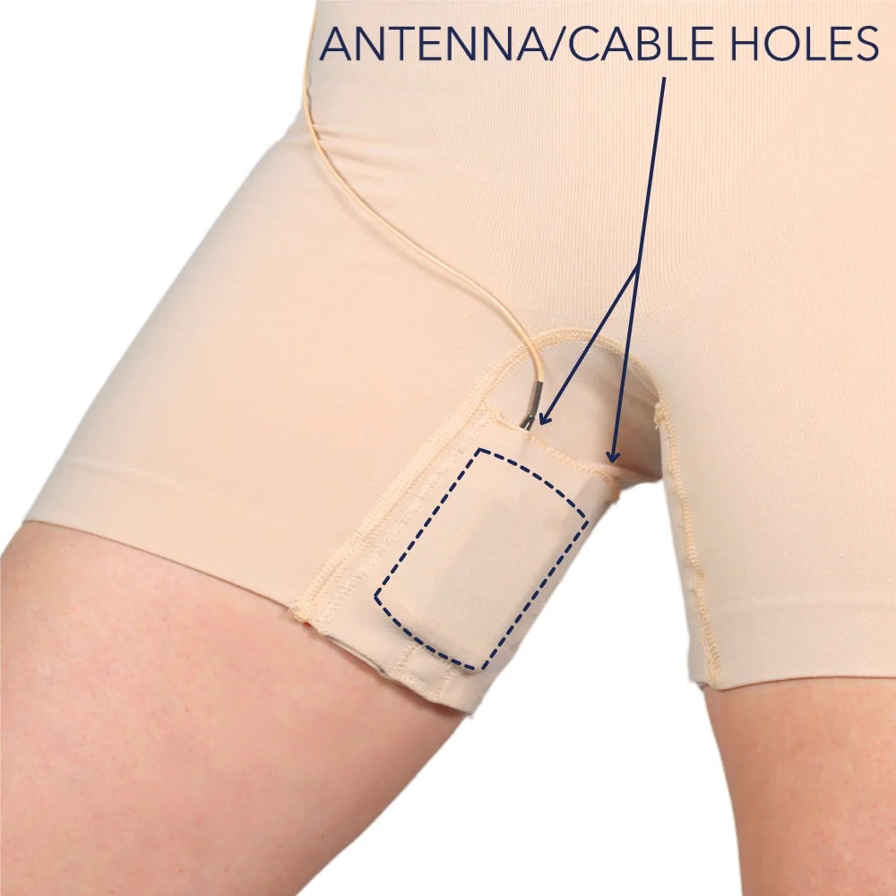 Beige shapewear shorts side view with cable hole and routing pouch