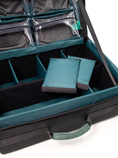 Open black organizer case with teal interior panels and clear pocket inserts.
