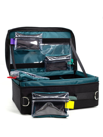 Open black organizer case with teal lining, clear zipper pouches, and storage trays.