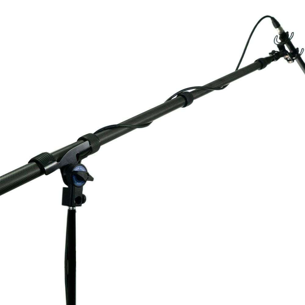 Black boom pole holder attached to a carbon-fiber style boom pole