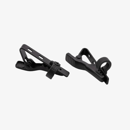 Pair of black IEM clips with hinges and mounting teeth