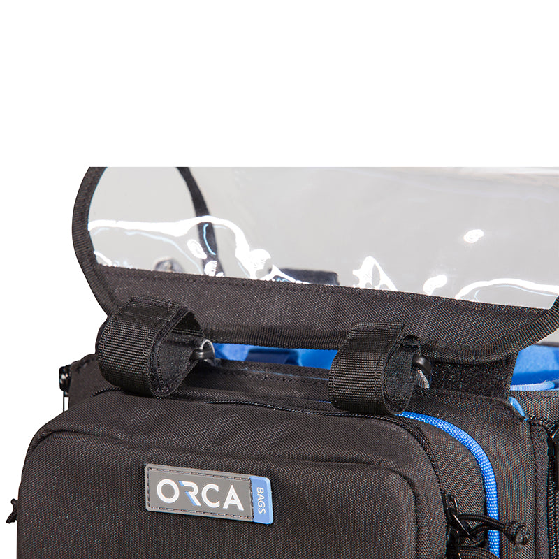 Close-up of black audio mixer bag front pocket with ORCA logo