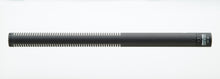 Shotgun microphone with long cylindrical body and side controls near the handle