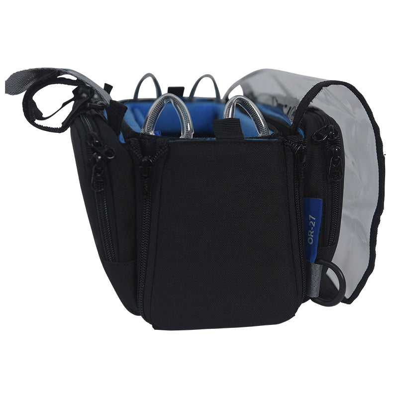 Small audio mixer carrying bag, black exterior with blue interior, zippered pockets