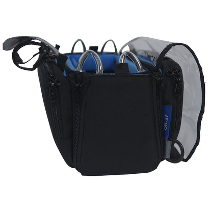 Small audio mixer carrying bag, black exterior with blue interior, zippered pockets