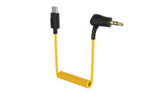 Coiled 3.5mm TRS to USB-C timecode audio cable with yellow cord and gold connectors