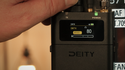 Black DEITY digital IFB receiver with LCD showing TX and power settings