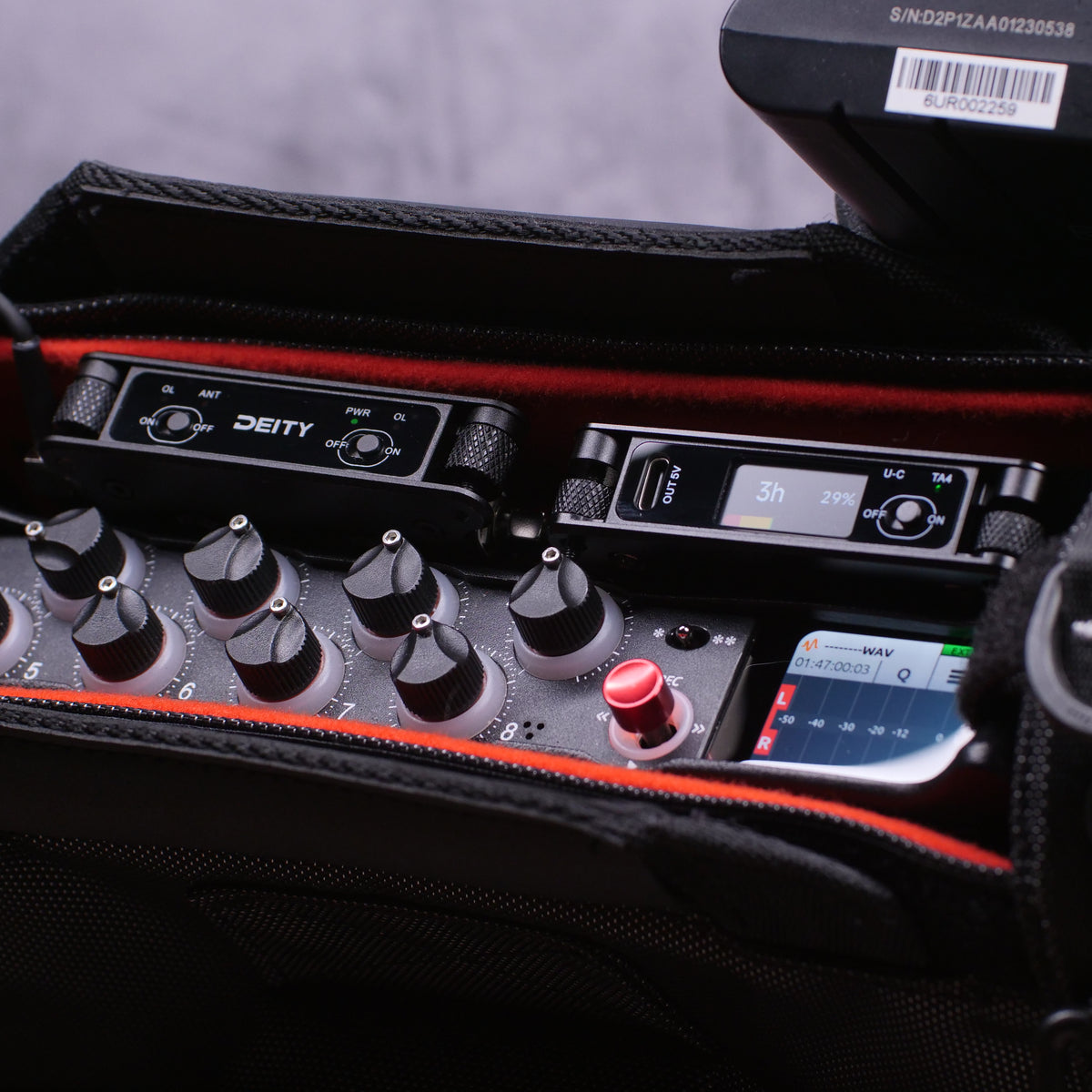 RF signal distributor control panel with knobs, switches, and status display