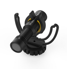 Black microphone on shock mount with side cable loops and yellow ring detail