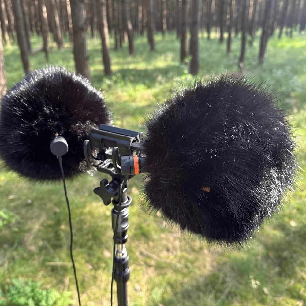 Fur wind jacket, black faux-fur wind covers on boom microphones
