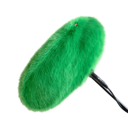 Green faux-fur wind jacket for microphone, close view with black mounting