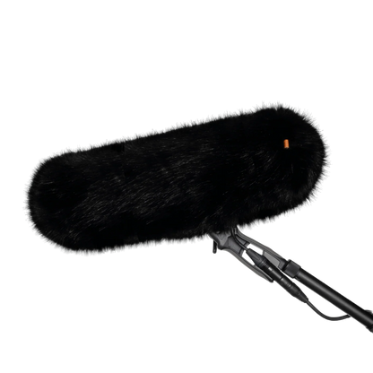 Black faux-fur wind jacket for microphone, elongated rounded cover