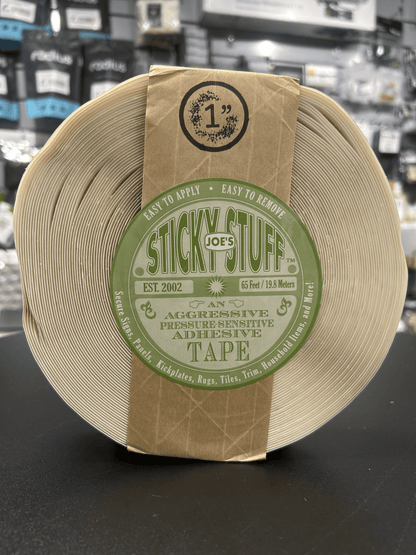1 in adhesive tape roll with tan backing and green Stick'Em Stuff label