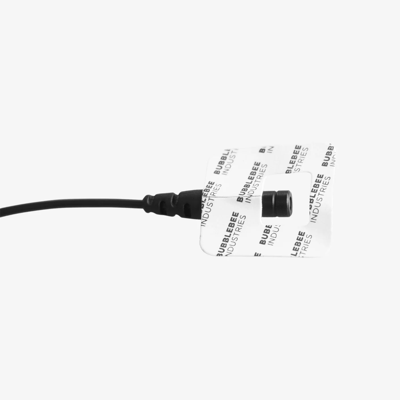Beige lav tape roll segment with black cord and white label