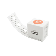 Invisible lav tape roll dispenser with white strip backing