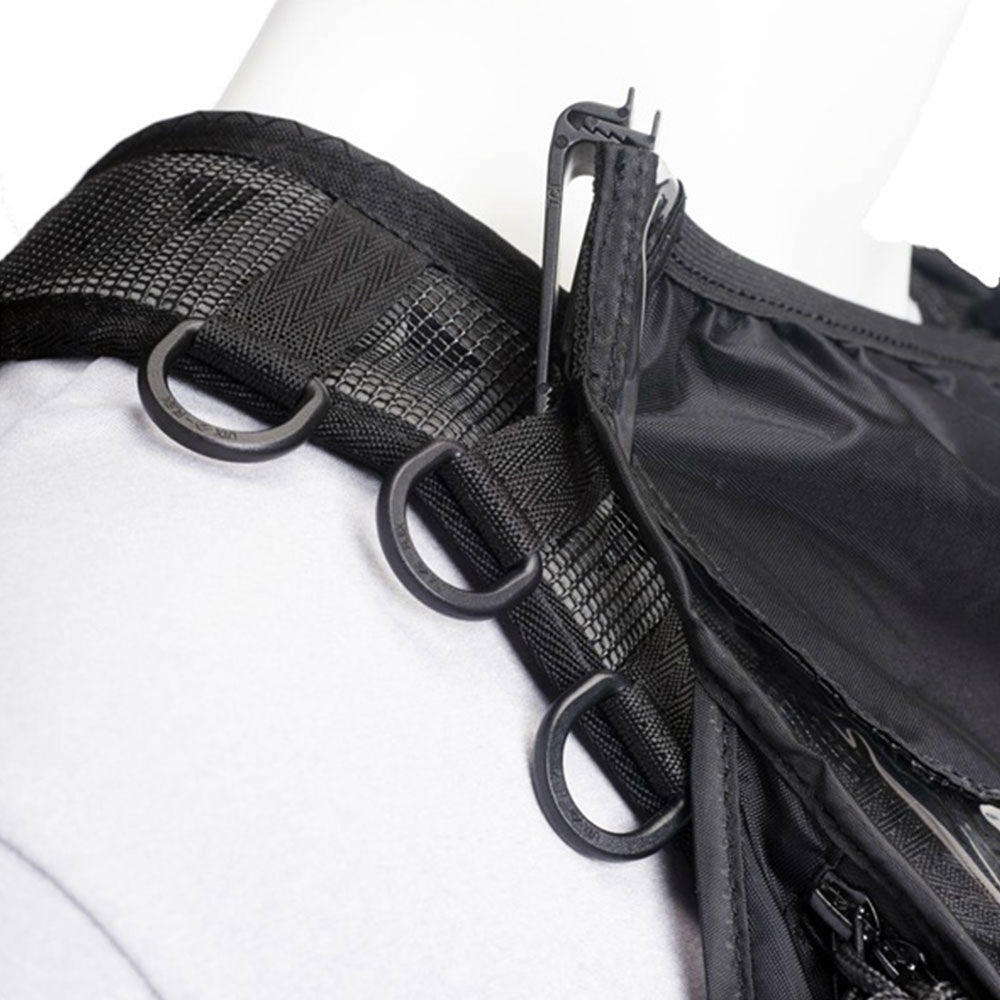 Black rain bib chest strap with textured webbing and three metal D-rings