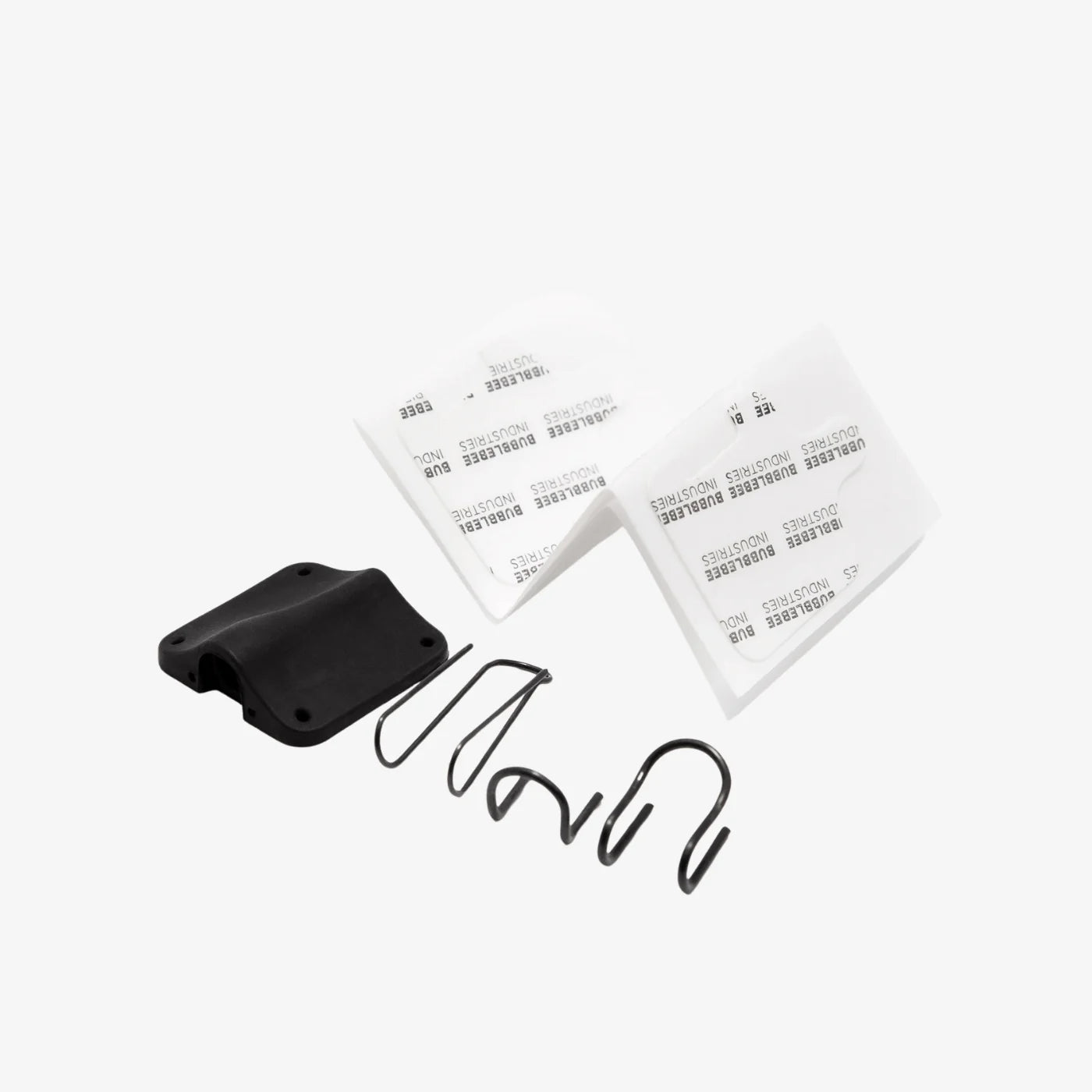 Black lav concealer mount with two white label stickers and curved wire loops