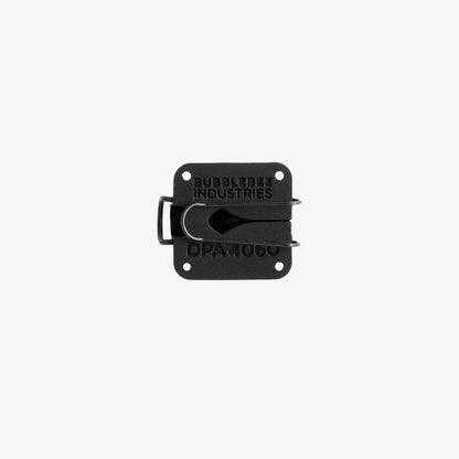 Black lav microphone concealer labeled DPA 4060 with mounting slots