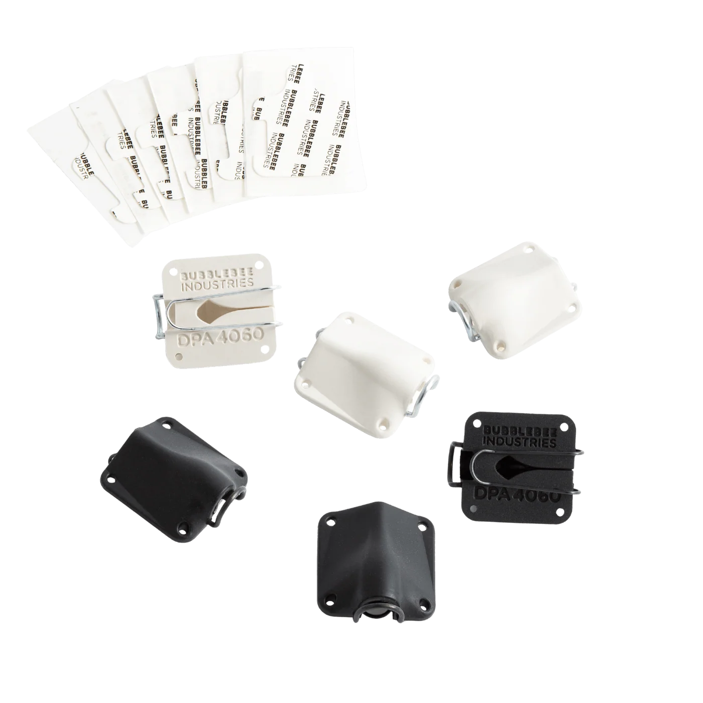Lav mic concealer parts, white and black models with printed DPA markings and clips